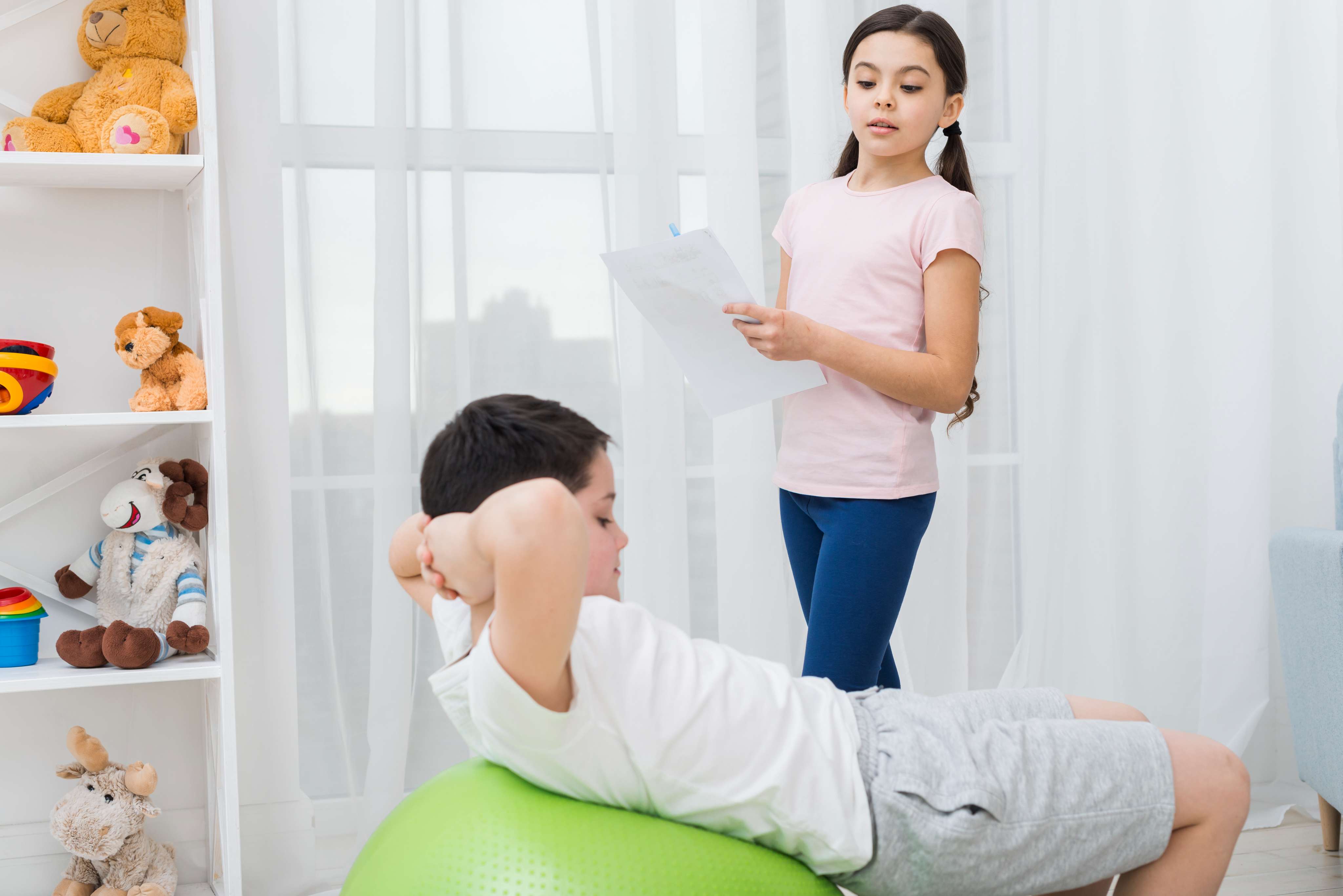 Happy child in physiotherapy session