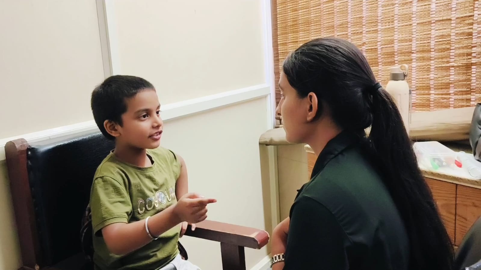 Child in speech therapy session at Blooming Words
