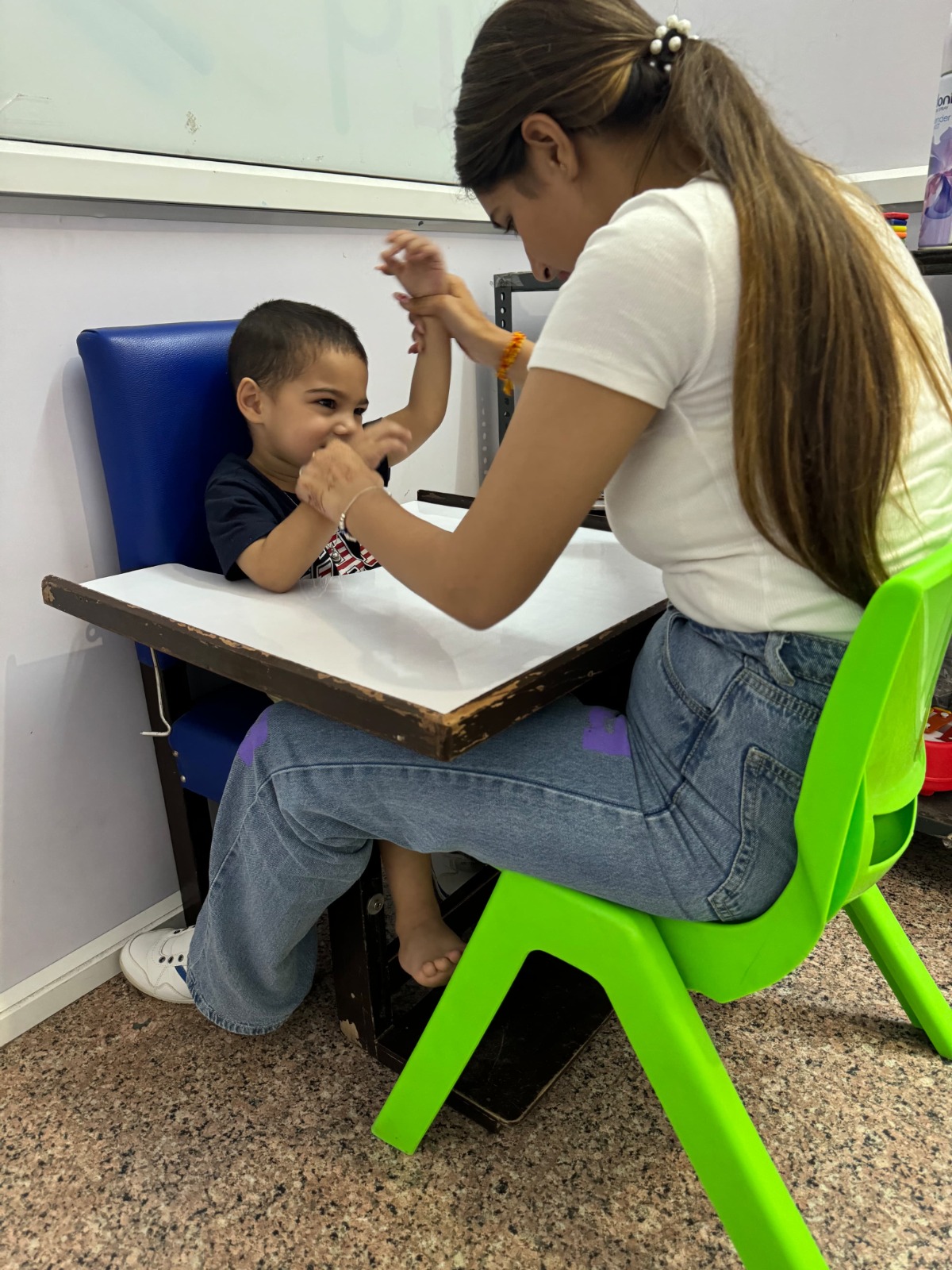 Client in oral placement therapy session at our Delhi center