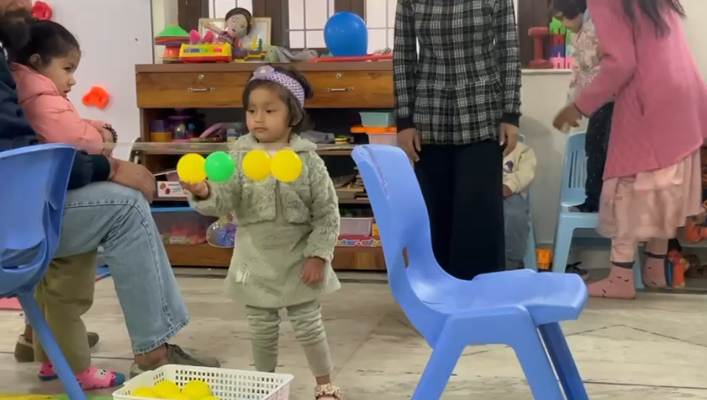 Child in speech therapy session at Blooming Words